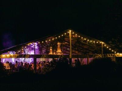 Marquee with festoon lights at night