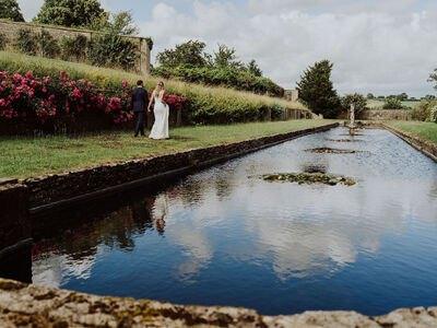 Couple beside the ornamental canal